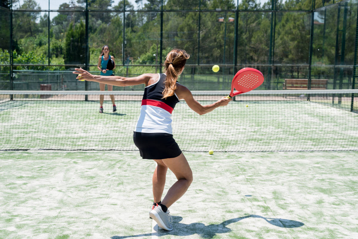 photo of a female padel tennis player